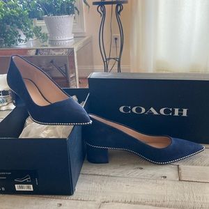 Navy blue suede coach pumps